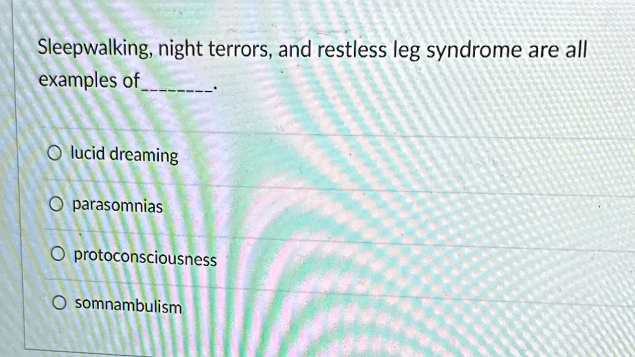 overhead view of corned beef sliced and on a platter with cabbage, potatoes, and carrots